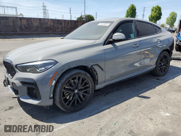 2022 BMW X6 xDrive40i z VIN 5UXCY6C01N9M95573, wystawiony jako Copart lot #54049805 z przebiegiem 24 031 mil mil oraz Szkoda całkowita • Salvage title. Historia ofert i sprzedaży dostępna na DreamBid. Obrazek 1.