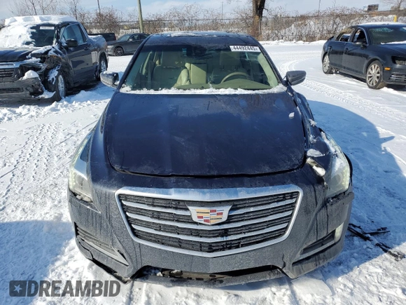 2015 Cadillac CTS Luxury AWD with VIN 1G6AX5SX5F0142864, listed as a Copart auction lot 44492445 with 87,199 mi miles and Salvage Title. Bid and sale history available at DreamBid. Image 5.