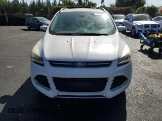 2014 Ford Escape Titanium z VIN 1FMCU0J9XEUD01904, wystawiony jako Copart lot #61819555 z przebiegiem 217 794 mil mil oraz Czysty tytuł • Clean title. Historia ofert i sprzedaży dostępna na DreamBid. Obrazek 5.
