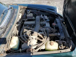 1983 Alfa Romeo Spider Veloce z VIN ZARBA541XD1016802, wystawiony jako Copart lot #51383595 z przebiegiem 127 904 mil mil oraz Czysty tytuł • Clean title. Historia ofert i sprzedaży dostępna na DreamBid. Obrazek 11.