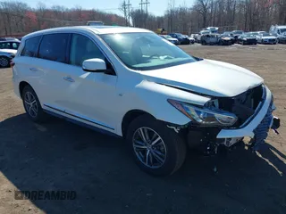 2020 Infiniti QX60 LUXE with VIN 5N1DL0MM2LC503484, listed as a IAAI auction lot 41859842 with 76,966 mi miles. Bid and sale history available at carsss.com. Image 1.