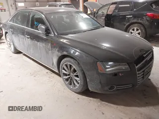 2012 Audi A8 L with VIN WAURVAFD8CN017335, listed as a IAAI auction lot 41459511 with 138,803 mi miles. Bid and sale history available at carsss.com. Image 1.