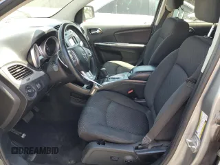 2017 Dodge Journey SXT z VIN 3C4PDCBG7HT547666, wystawiony jako Copart lot #57987875 z przebiegiem 124 484 mil mil oraz Szkoda całkowita • Salvage title. Historia ofert i sprzedaży dostępna na DreamBid. Obrazek 7.
