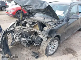 2015 BMW X1 xDrive28i with VIN WBAVL1C57FVY28954, listed as a IAAI auction lot 41857286 with 1 mi miles. Bid and sale history available at carsss.com. Image 14.