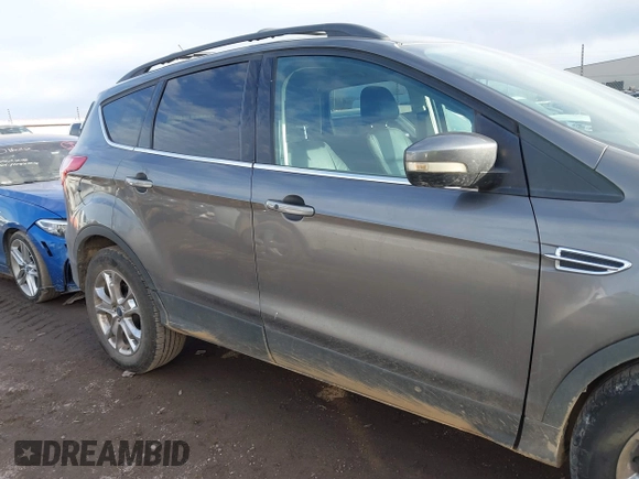 2013 Ford Escape SEL with VIN 1FMCU0HX1DUD51965, listed as a IAAI auction lot 41667262 with 164,493 mi miles and . Bid and sale history available at DreamBid. Image 13.