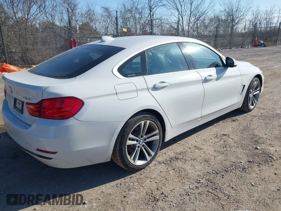2016 BMW 4 Series 428i xDrive with VIN WBA4C9C59GG138090, listed as a IAAI auction lot 41560267 with 94,010 mi miles and . Bid and sale history available at carsss.com. Image 4.