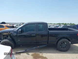2015 Ford F-150 XL with VIN 1FTEX1CP7FKE54582, listed as a IAAI auction lot 41948341 with 126,309 mi miles and . Bid and sale history available at DreamBid. Image 14.