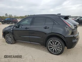 2024 Cadillac XT4 FWD Sport with VIN 1GYFZER46RF213543, listed as a Copart auction lot 83609754 with 3,878 mi miles and Salvage title. Bid and sale history available at DreamBid. Image 2.