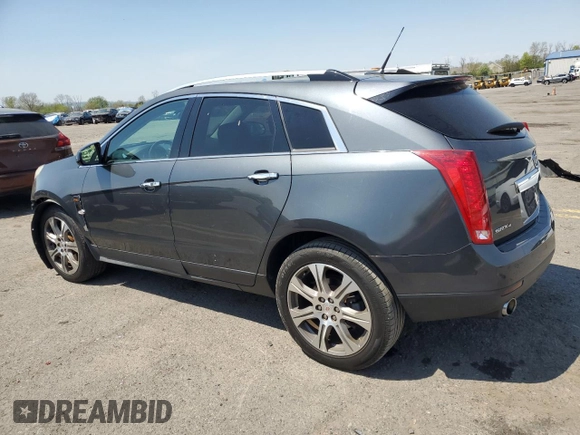 2012 Cadillac SRX Performance Collection with VIN 3GYFNEE34CS590058, listed as a Copart auction lot 54548545 with 122,070 mi miles and Salvage Title. Bid and sale history available at carsss.com. Image 2.