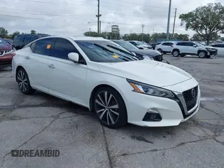 2020 Nissan Altima Platinum with VIN 1N4BL4FV0LC146255, listed as a IAAI auction lot 41043847 with 74,521 mi miles and . Bid and sale history available at carsss.com. Image 1.