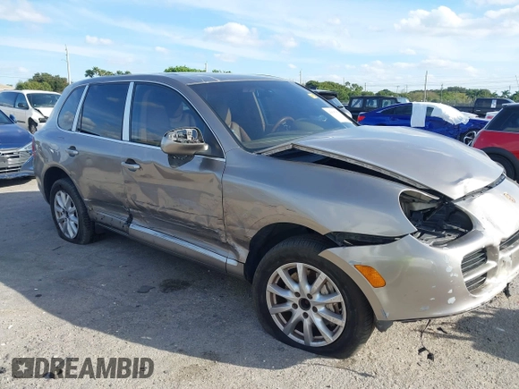 2005 Porsche Cayenne S with VIN WP1AB29P75LA61263, listed as a IAAI auction lot 41635350 with 242,874 mi miles. Bid and sale history available at carsss.com. Image 6.