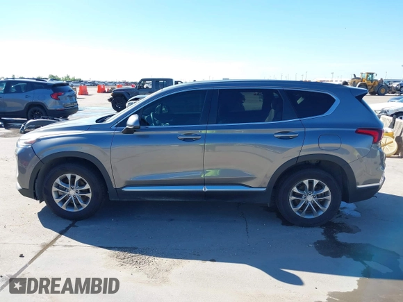 2019 Hyundai Santa Fe SE z VIN 5NMS23AD9KH037539, wystawiony jako IAAI lot #42221894 z przebiegiem 87 755 mil mil oraz . Historia ofert i sprzedaży dostępna na DreamBid. Obrazek 14.
