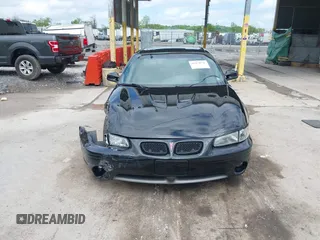 2001 Pontiac Grand Prix GTP z VIN 1G2WR12161F224789, wystawiony jako IAAI lot #42274536 z przebiegiem 125 098 mil mil oraz . Historia ofert i sprzedaży dostępna na DreamBid. Obrazek 12.