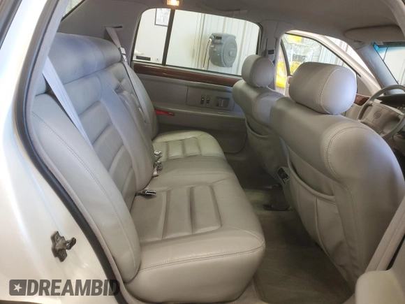 1994 Cadillac DeVille z VIN 1G6KD52B7RU290139, wystawiony jako Copart lot #46899465 z przebiegiem 133 110 mil mil oraz Czysty tytuł • Clean title. Historia ofert i sprzedaży dostępna na DreamBid. Obrazek 10.