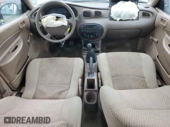 1999 Ford Escort LX with VIN 1FAFP10P6XW196483, listed as a Copart auction lot 59215635 with 74,859 mi miles and Salvage title. Bid and sale history available at DreamBid. Image 8.