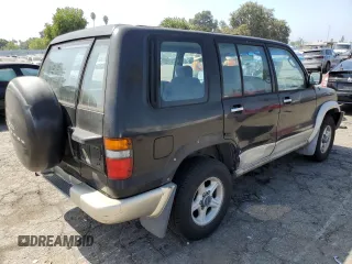 1999 Isuzu Trooper S z VIN JACDJ58X4X7926429, wystawiony jako Copart lot #72969694 z przebiegiem 160 843 mil mil oraz Szkody całkowita. Historia ofert i sprzedaży dostępna na DreamBid. Obrazek 3.