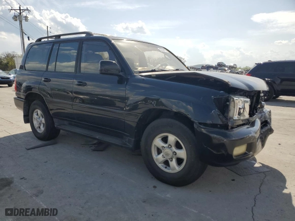 1999 Toyota Land Cruiser with VIN JT3HT05J8X0060988, listed as a Copart auction lot 52764175 with 217,199 mi miles and Salvage Title. Bid and sale history available at carsss.com. Image 4.