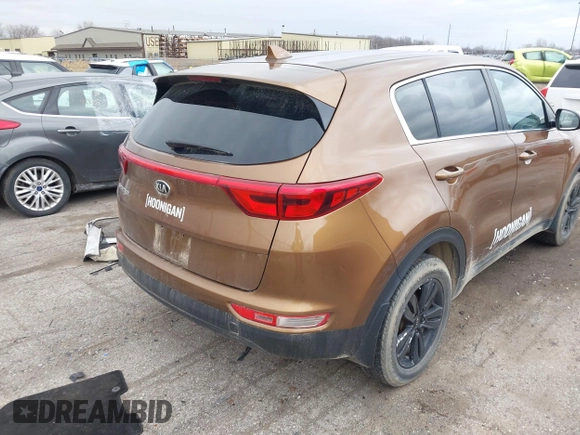 2018 Kia Sportage LX with VIN KNDPMCAC3J7422785, listed as a IAAI auction lot 41869603 with 84,378 mi miles. Bid and sale history available at carsss.com. Image 4.