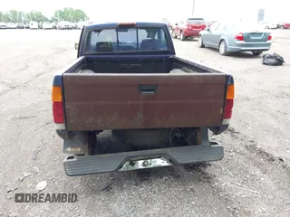 1995 Nissan Frontier XE with VIN 1N6SD11Y4SC318791, listed as a IAAI auction lot 42335599 with Not provided miles and . Bid and sale history available at DreamBid. Image 12.
