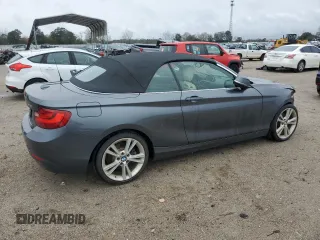 2015 BMW 2 Series 228i with VIN WBA1K5C57FV474037, listed as a Copart auction lot 87857635 with 91,333 mi miles and Salvage title. Bid and sale history available at DreamBid. Image 3.