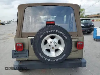 2003 Jeep Wrangler Sahara with VIN 1J4FA59S13P312830, listed as a Copart auction lot 52730955 with 99,247 mi miles and Salvage title. Bid and sale history available at DreamBid. Image 6.