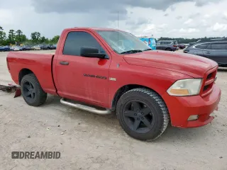2012 Ram 1500 Express with VIN 3C6JD6AT4CG201072, listed as a Copart auction lot 60130655 with 147,324 mi miles and Salvage title. Bid and sale history available at DreamBid. Image 4.