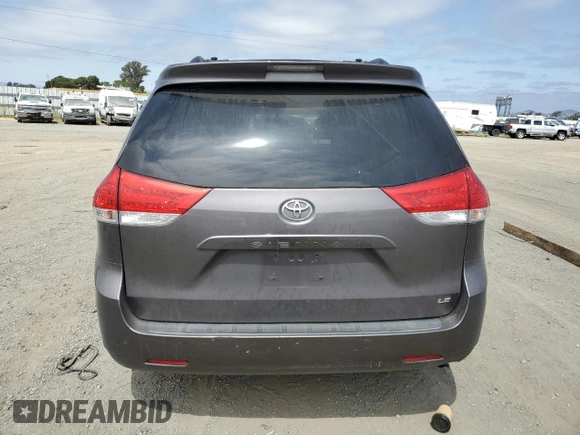 2014 Toyota Sienna LE AAS with VIN 5TDKK3DC6ES491574, listed as a Copart auction lot 59815785 with 189,975 mi miles and Salvage title. Bid and sale history available at DreamBid. Image 6.