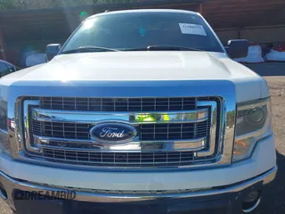 2014 Ford F-150 XL with VIN 1FTFW1EF9EFB42928, listed as a IAAI auction lot 41588979 with 154,192 mi miles. Bid and sale history available at carsss.com. Image 11.