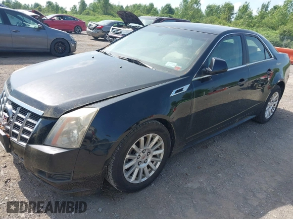 2012 Cadillac CTS Luxury z VIN 1G6DG5E58C0134874, wystawiony jako IAAI lot #42564120 z przebiegiem 121 053 mil mil oraz . Historia ofert i sprzedaży dostępna na DreamBid. Obrazek 2.