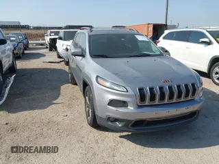 2016 Jeep Cherokee Latitude with VIN 1C4PJLCB7GW256587, listed as a IAAI auction lot 42037539 with 209,267 mi miles. Bid and sale history available at carsss.com. Image 1.
