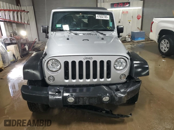 2014 Jeep Wrangler Unlimited Sport with VIN 1C4BJWDG9EL140263, listed as a Copart auction lot 47652785 with 39,493 mi miles and Salvage Title. Bid and sale history available at DreamBid. Image 5.