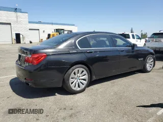 2011 BMW 7 Series with VIN WBAKX8C55BC198292, listed as a Copart auction lot 57907915 with 76,478 mi miles and Salvage title. Bid and sale history available at DreamBid. Image 3.