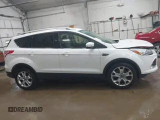 2014 Ford Escape Titanium with VIN 1FMCU9J90EUD21552, listed as a IAAI auction lot 42102148 with 183,539 mi miles. Bid and sale history available at carsss.com. Image 13.