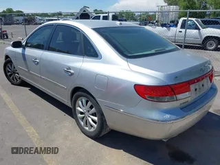2007 Hyundai Azera SE with VIN KMHFC46F17A199984, listed as a IAAI auction lot 42357676 with 215,196 mi miles and . Bid and sale history available at DreamBid. Image 3.