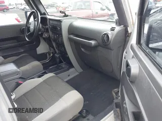2007 Jeep Wrangler Unlimited X with VIN 1J4GA39187L209448, listed as a IAAI auction lot 42104328 with 138,302 mi miles and . Bid and sale history available at DreamBid. Image 5.