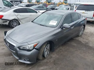 2015 Infiniti Q50 Premium z VIN JN1BV7AR7FM408015, wystawiony jako IAAI lot #42083301 z przebiegiem 58 817 mil mil oraz . Historia ofert i sprzedaży dostępna na DreamBid. Obrazek 2.