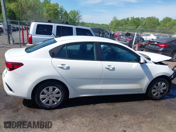 2022 Kia Rio S with VIN 3KPA24AD7NE492807, listed as a IAAI auction lot 42050520 with 100,756 mi miles. Bid and sale history available at carsss.com. Image 14.