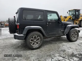 2013 Jeep Wrangler Rubicon 10th Anniversary with VIN 1C4BJWCG6DL507667, listed as a Copart auction lot 84139134 with 264,970 mi miles and Salvage Title. Bid and sale history available at DreamBid. Image 3.