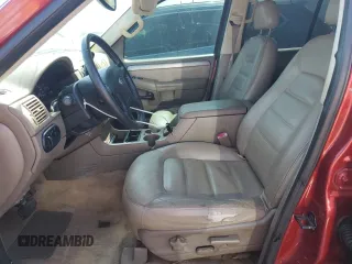 2004 Ford Explorer XLT with VIN 1FMZU73K24UB07921, listed as a Copart auction lot 55322585 with 117,293 mi miles and Salvage title. Bid and sale history available at DreamBid. Image 7.