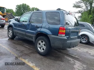 2005 Ford Escape XLT with VIN 1FMYU03165KD74390, listed as a IAAI auction lot 42799963 with 262,762 mi miles and . Bid and sale history available at DreamBid. Image 3.