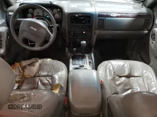 2001 Jeep Grand Cherokee Limited with VIN 1J4GW58N01C664996, listed as a Copart auction lot 58339825 with 288,153 mi miles and Salvage title. Bid and sale history available at DreamBid. Image 8.
