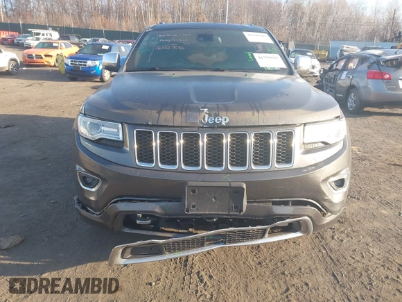 2015 Jeep Grand Cherokee Overland with VIN 1C4RJFCT3FC725239, listed as a IAAI auction lot 41779555 with 100,837 mi miles. Bid and sale history available at carsss.com. Image 6.