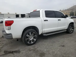 2011 Toyota Tundra with VIN 5TFEM5F19BX023519, listed as a Copart auction lot 58642205 with 157,480 mi miles and Salvage title. Bid and sale history available at DreamBid. Image 3.