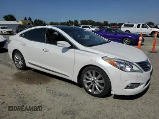 2013 Hyundai Azera z VIN KMHFH4JG9DA209562, wystawiony jako Copart lot #59808655 z przebiegiem 130 994 mil mil oraz Szkoda całkowita • Salvage title. Historia ofert i sprzedaży dostępna na DreamBid. Obrazek 4.