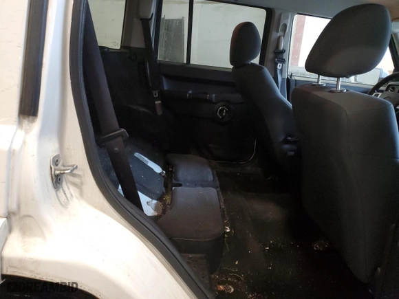 2010 Jeep Commander Sport with VIN 1J4RG4GK2AC158450, listed as a Copart auction lot 46210865 with 222,500 mi miles and Salvage Title. Bid and sale history available at carsss.com. Image 12.