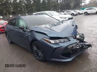 2021 Toyota Avalon Hybrid XSE z VIN 4T1EA1AB9MU007905, wystawiony jako IAAI lot #40501204 z przebiegiem 86 869 mil mil oraz . Historia ofert i sprzedaży dostępna na DreamBid. Obrazek 1.