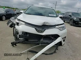 2016 Toyota RAV4 Limited with VIN 2T3DFREVXGW495077, listed as a Copart auction lot 55533505 with 122,483 mi miles and Salvage title. Bid and sale history available at DreamBid. Image 14.