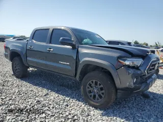 2021 Toyota Tacoma SR5 z VIN 3TMAZ5CNXMM156385, wystawiony jako Copart lot #57384245 z przebiegiem 61 686 mil mil oraz Nie do naprawy • Non repairable. Historia ofert i sprzedaży dostępna na DreamBid. Obrazek 4.