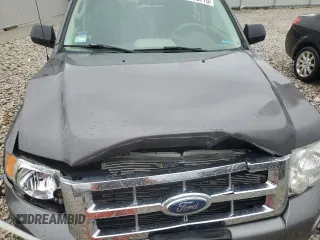 2009 Ford Escape XLS z VIN 1FMCU02799KC31553, wystawiony jako Copart lot #55219775 z przebiegiem 109 154 mil mil oraz Szkoda całkowita • Salvage title. Historia ofert i sprzedaży dostępna na DreamBid. Obrazek 12.