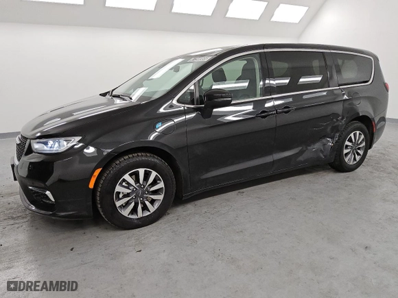 2023 Chrysler Pacifica Hybrid Touring L with VIN 2C4RC1L70PR631392, listed as a Copart auction lot 47396985 with 73,157 mi miles and Clean Title. Bid and sale history available at carsss.com. Image 1.